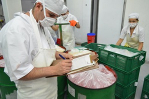 AEG Employees With Los Angeles Food Bank Takes Food To People In Need