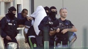 France’s charges beheading suspect with terrorism charges